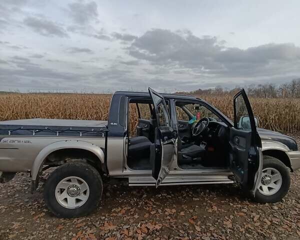 Синій Міцубісі Л 200, об'ємом двигуна 0 л та пробігом 276 тис. км за 5300 $, фото 9 на Automoto.ua