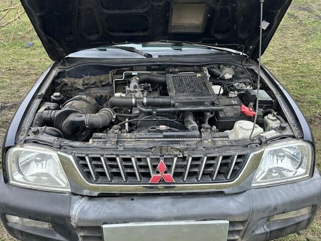 Синій Міцубісі Л 200, об'ємом двигуна 2.5 л та пробігом 321 тис. км за 4455 $, фото 5 на Automoto.ua