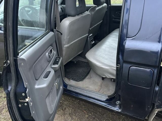 Синій Міцубісі Л 200, об'ємом двигуна 2.5 л та пробігом 321 тис. км за 4455 $, фото 7 на Automoto.ua