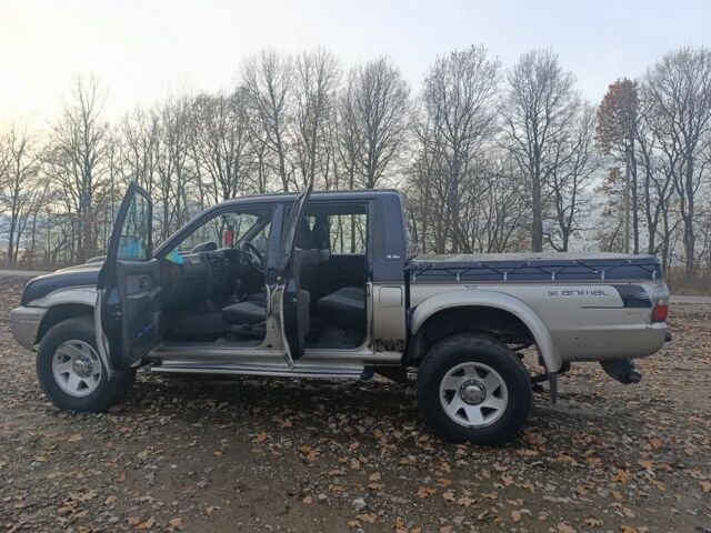 Синій Міцубісі Л 200, об'ємом двигуна 2.5 л та пробігом 276 тис. км за 5300 $, фото 17 на Automoto.ua