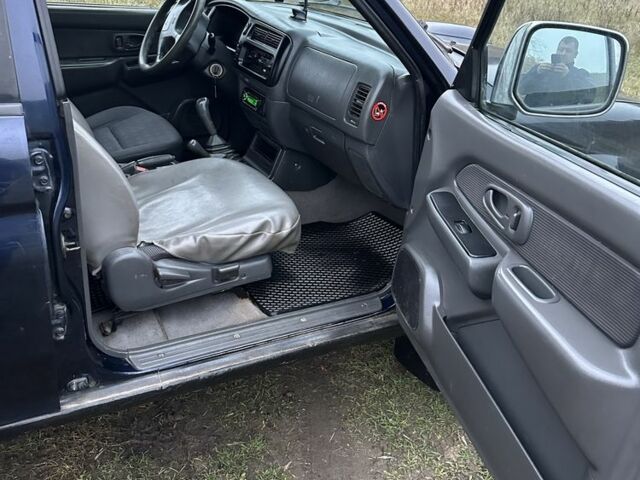 Синій Міцубісі Л 200, об'ємом двигуна 2.5 л та пробігом 321 тис. км за 4455 $, фото 8 на Automoto.ua