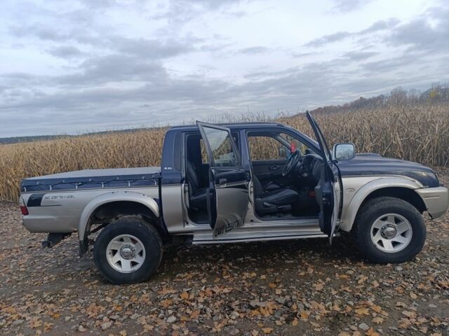 Синій Міцубісі Л 200, об'ємом двигуна 2.5 л та пробігом 276 тис. км за 5300 $, фото 11 на Automoto.ua