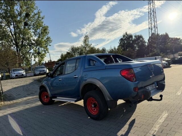 Синий Мицубиси Л 200, объемом двигателя 2.5 л и пробегом 280 тыс. км за 4100 $, фото 2 на Automoto.ua