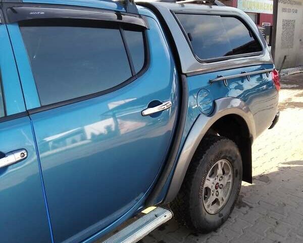 Синій Міцубісі Л 200, об'ємом двигуна 2.48 л та пробігом 224 тис. км за 12350 $, фото 6 на Automoto.ua