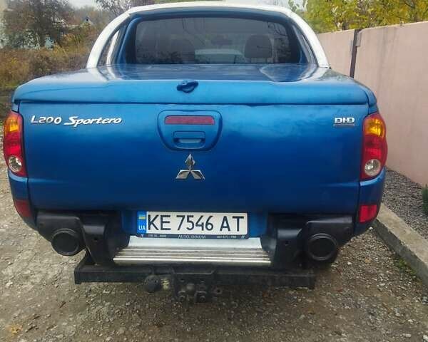 Синій Міцубісі Л 200, об'ємом двигуна 2.48 л та пробігом 322 тис. км за 10500 $, фото 3 на Automoto.ua
