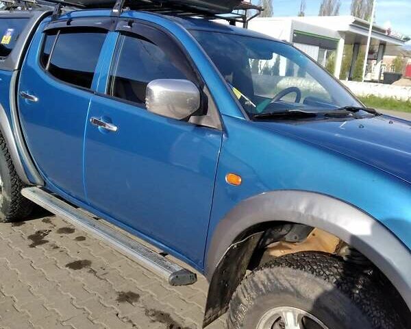 Синій Міцубісі Л 200, об'ємом двигуна 2.48 л та пробігом 224 тис. км за 12350 $, фото 3 на Automoto.ua