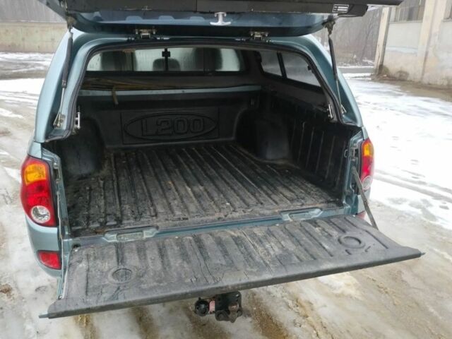 Синий Мицубиси Л 200, объемом двигателя 2.5 л и пробегом 260 тыс. км за 3800 $, фото 10 на Automoto.ua