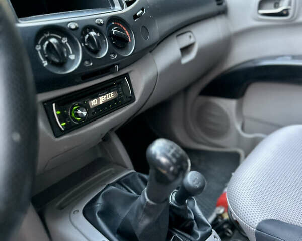Мицубиси Л 200 2008 в Киеве на Automoto.ua Синий Мицубиси Л 200, объемом двигателя 2.48 л и пробегом 282 тыс. км за 11300 $, фото 11 на Automoto.ua