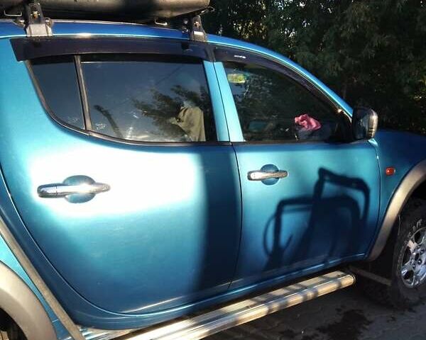 Синій Міцубісі Л 200, об'ємом двигуна 2.48 л та пробігом 224 тис. км за 12350 $, фото 2 на Automoto.ua