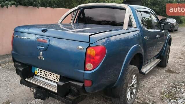 Синий Мицубиси Л 200, объемом двигателя 2.5 л и пробегом 320 тыс. км за 10500 $, фото 1 на Automoto.ua