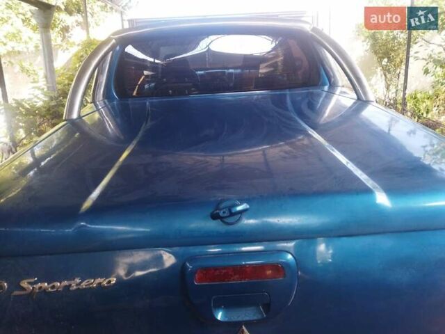 Синій Міцубісі Л 200, об'ємом двигуна 2.48 л та пробігом 322 тис. км за 10500 $, фото 2 на Automoto.ua