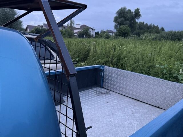 Синій Міцубісі Л 200, об'ємом двигуна 2.4 л та пробігом 110 тис. км за 5500 $, фото 3 на Automoto.ua