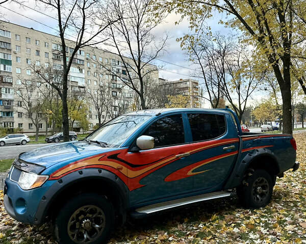 Мицубиси Л 200 2008 в Киеве на Automoto.ua Синий Мицубиси Л 200, объемом двигателя 2.48 л и пробегом 282 тыс. км за 11300 $, фото 1 на Automoto.ua