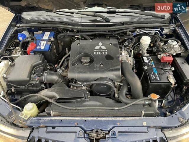 Синий Мицубиси Л 200, объемом двигателя 2.5 л и пробегом 291 тыс. км за 8200 $, фото 17 на Automoto.ua