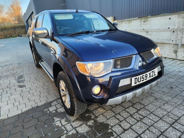 Синий Мицубиси Л 200, объемом двигателя 2.5 л и пробегом 154 тыс. км за 8678 $, фото 2 на Automoto.ua