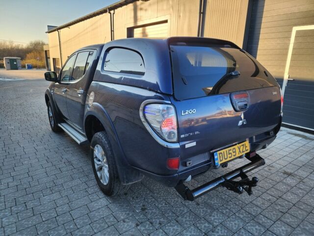 Синий Мицубиси Л 200, объемом двигателя 2.5 л и пробегом 154 тыс. км за 8678 $, фото 7 на Automoto.ua