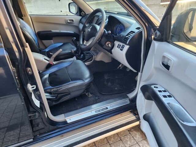 Синий Мицубиси Л 200, объемом двигателя 2.5 л и пробегом 154 тыс. км за 8678 $, фото 12 на Automoto.ua