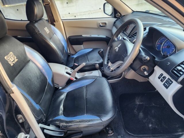 Синий Мицубиси Л 200, объемом двигателя 2.5 л и пробегом 154 тыс. км за 8678 $, фото 13 на Automoto.ua