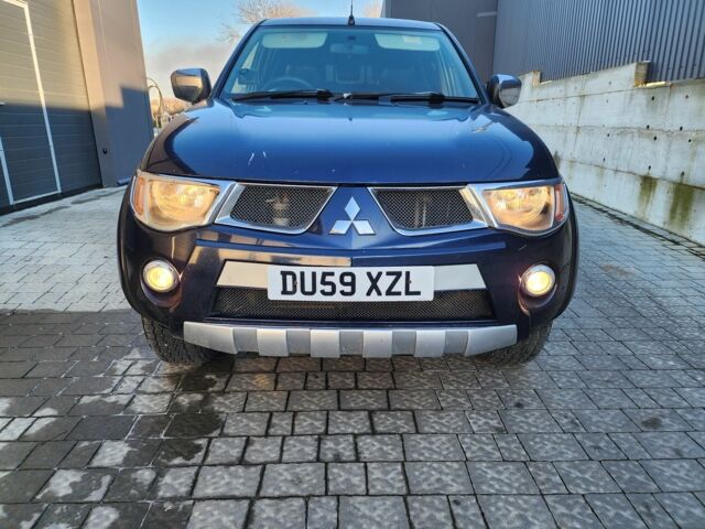 Синий Мицубиси Л 200, объемом двигателя 2.5 л и пробегом 154 тыс. км за 8678 $, фото 3 на Automoto.ua