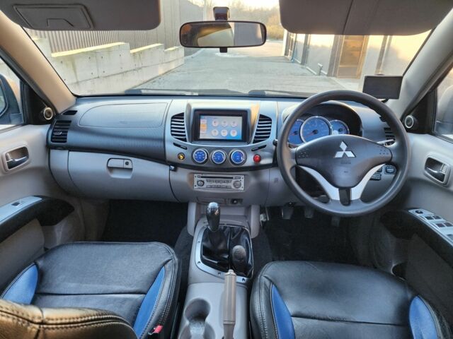 Синий Мицубиси Л 200, объемом двигателя 2.5 л и пробегом 154 тыс. км за 8678 $, фото 23 на Automoto.ua