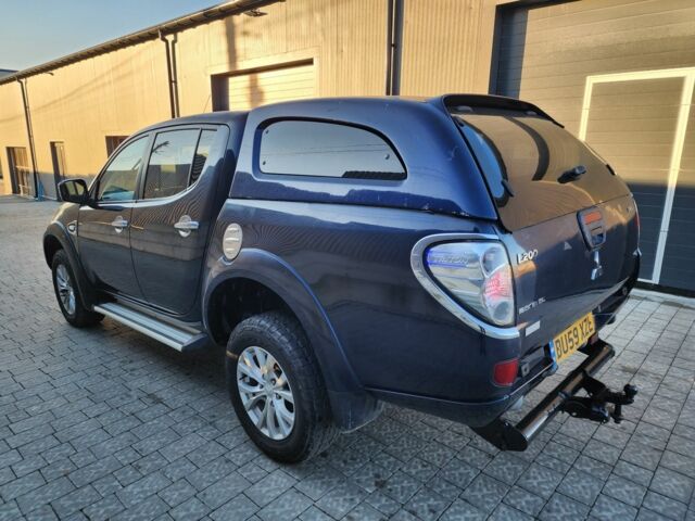 Синий Мицубиси Л 200, объемом двигателя 2.5 л и пробегом 154 тыс. км за 8678 $, фото 8 на Automoto.ua