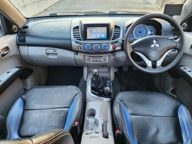 Синий Мицубиси Л 200, объемом двигателя 2.5 л и пробегом 154 тыс. км за 8678 $, фото 22 на Automoto.ua