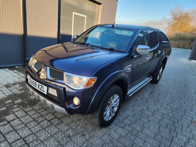 Синий Мицубиси Л 200, объемом двигателя 2.5 л и пробегом 154 тыс. км за 8678 $, фото 5 на Automoto.ua