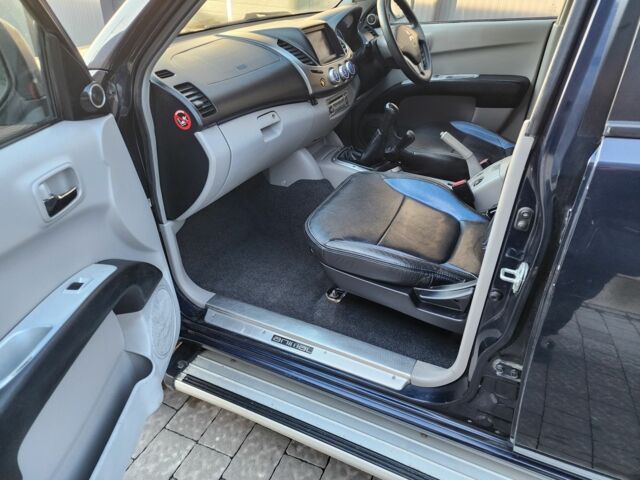 Синий Мицубиси Л 200, объемом двигателя 2.5 л и пробегом 154 тыс. км за 8678 $, фото 17 на Automoto.ua