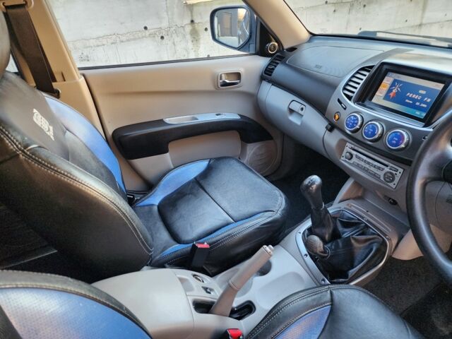 Синий Мицубиси Л 200, объемом двигателя 2.5 л и пробегом 154 тыс. км за 8678 $, фото 15 на Automoto.ua