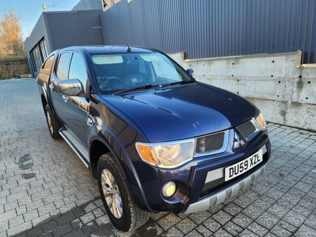 Синий Мицубиси Л 200, объемом двигателя 2.5 л и пробегом 154 тыс. км за 8678 $, фото 1 на Automoto.ua