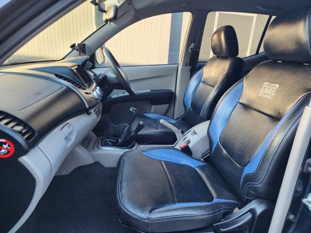 Синий Мицубиси Л 200, объемом двигателя 2.5 л и пробегом 154 тыс. км за 8678 $, фото 18 на Automoto.ua