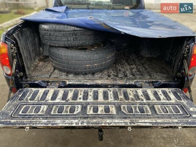 Синий Мицубиси Л 200, объемом двигателя 2.5 л и пробегом 291 тыс. км за 8200 $, фото 22 на Automoto.ua