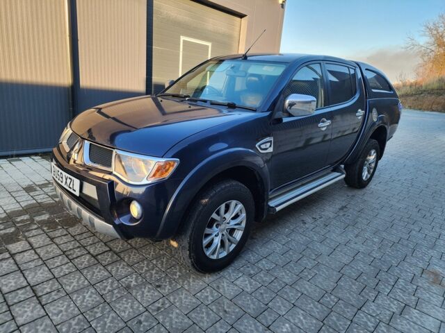 Синий Мицубиси Л 200, объемом двигателя 2.5 л и пробегом 154 тыс. км за 8678 $, фото 6 на Automoto.ua