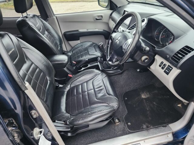 Синий Мицубиси Л 200, объемом двигателя 2.5 л и пробегом 131 тыс. км за 8724 $, фото 14 на Automoto.ua