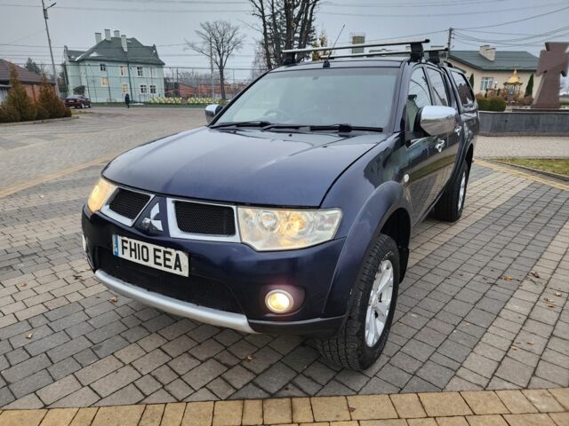 Синий Мицубиси Л 200, объемом двигателя 2.5 л и пробегом 131 тыс. км за 8724 $, фото 5 на Automoto.ua