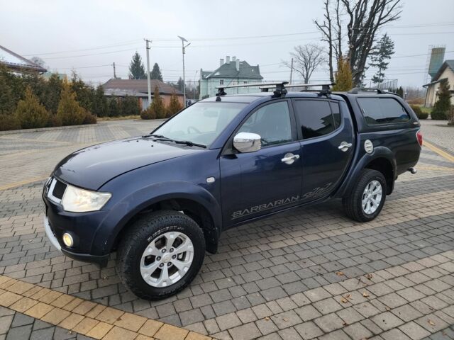 Синий Мицубиси Л 200, объемом двигателя 2.5 л и пробегом 131 тыс. км за 8724 $, фото 7 на Automoto.ua