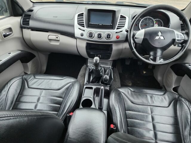 Синий Мицубиси Л 200, объемом двигателя 2.5 л и пробегом 131 тыс. км за 8724 $, фото 21 на Automoto.ua