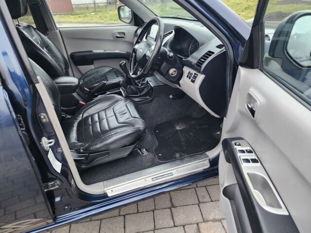 Синий Мицубиси Л 200, объемом двигателя 2.5 л и пробегом 131 тыс. км за 8724 $, фото 13 на Automoto.ua