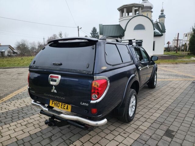 Синий Мицубиси Л 200, объемом двигателя 2.5 л и пробегом 131 тыс. км за 8724 $, фото 11 на Automoto.ua