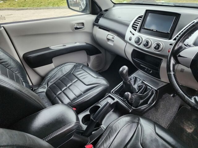 Синий Мицубиси Л 200, объемом двигателя 2.5 л и пробегом 131 тыс. км за 8724 $, фото 16 на Automoto.ua