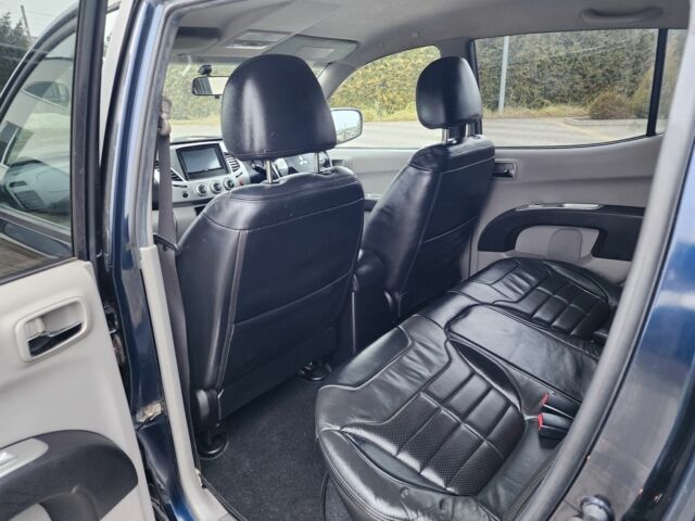 Синий Мицубиси Л 200, объемом двигателя 2.5 л и пробегом 131 тыс. км за 8724 $, фото 19 на Automoto.ua