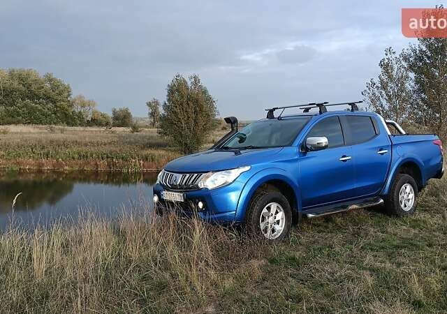 Синий Мицубиси Л 200, объемом двигателя 2.44 л и пробегом 270 тыс. км за 16500 $, фото 1 на Automoto.ua