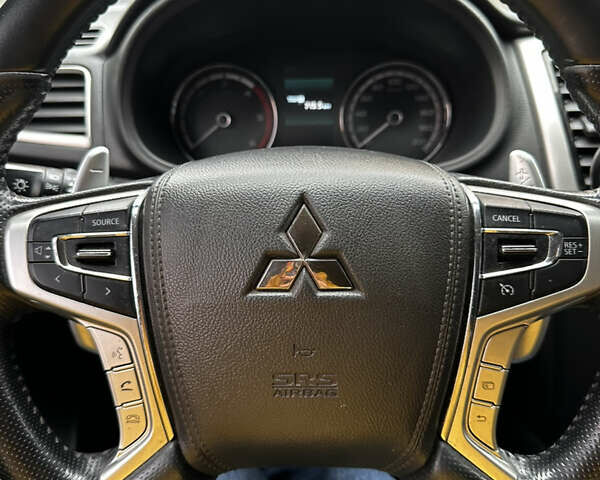 Синій Міцубісі Л 200, об'ємом двигуна 2.4 л та пробігом 180 тис. км за 31000 $, фото 4 на Automoto.ua