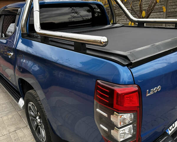 Синій Міцубісі Л 200, об'ємом двигуна 2.4 л та пробігом 180 тис. км за 31000 $, фото 6 на Automoto.ua