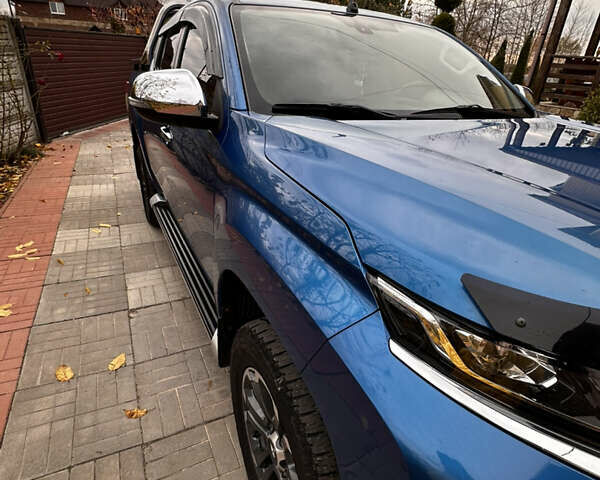 Синій Міцубісі Л 200, об'ємом двигуна 2.4 л та пробігом 180 тис. км за 31000 $, фото 7 на Automoto.ua