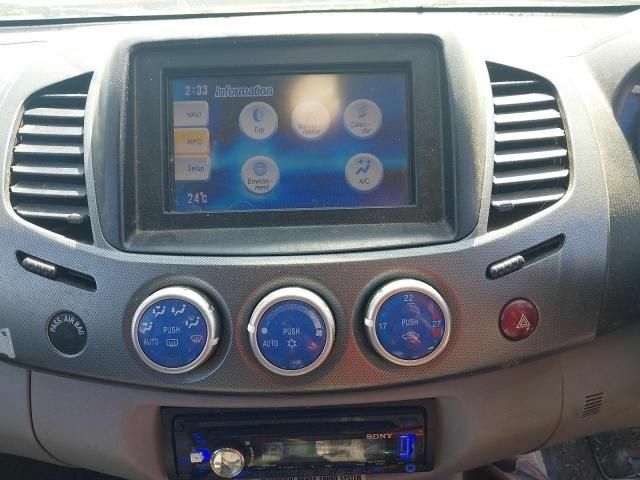 Синий Мицубиси Л 200, объемом двигателя 2.5 л и пробегом 160 тыс. км за 6437 $, фото 8 на Automoto.ua