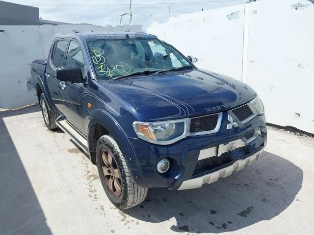 Синий Мицубиси Л 200, объемом двигателя 2.5 л и пробегом 160 тыс. км за 6437 $, фото 1 на Automoto.ua