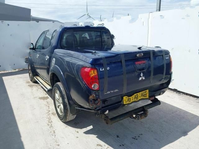 Синий Мицубиси Л 200, объемом двигателя 2.5 л и пробегом 160 тыс. км за 6437 $, фото 3 на Automoto.ua