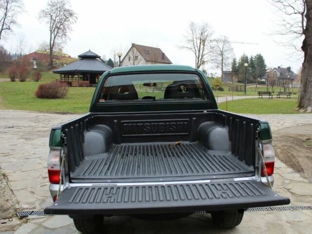 Зеленый Мицубиси Л 200, объемом двигателя 0 л и пробегом 228 тыс. км за 2650 $, фото 5 на Automoto.ua