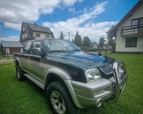 Зеленый Мицубиси Л 200, объемом двигателя 2.5 л и пробегом 268 тыс. км за 3100 $, фото 1 на Automoto.ua